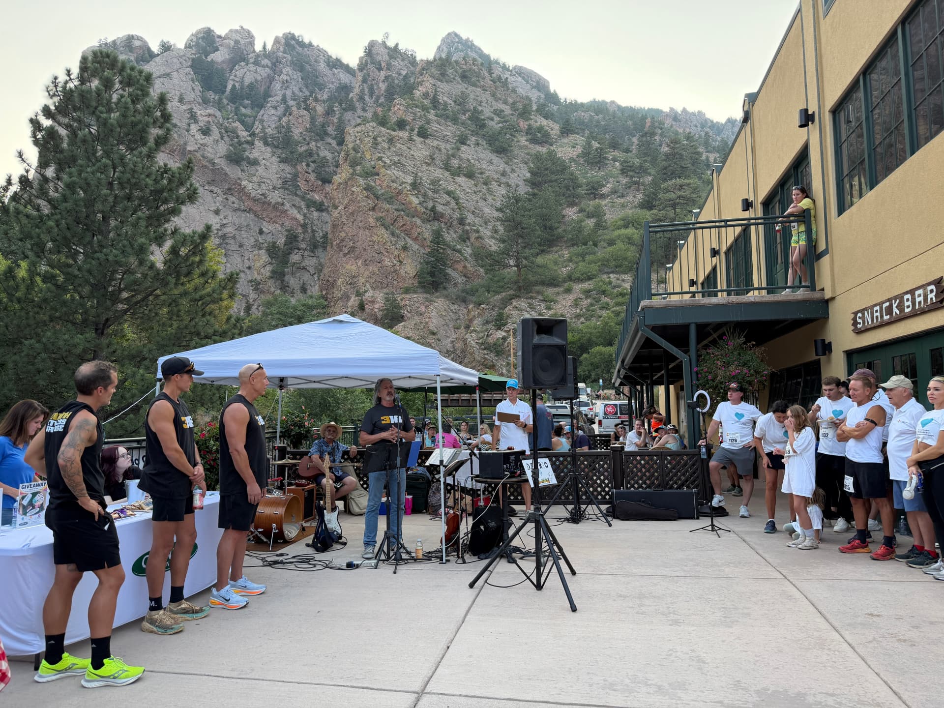 Speaker addressing runners at the Run for the Cure race morning