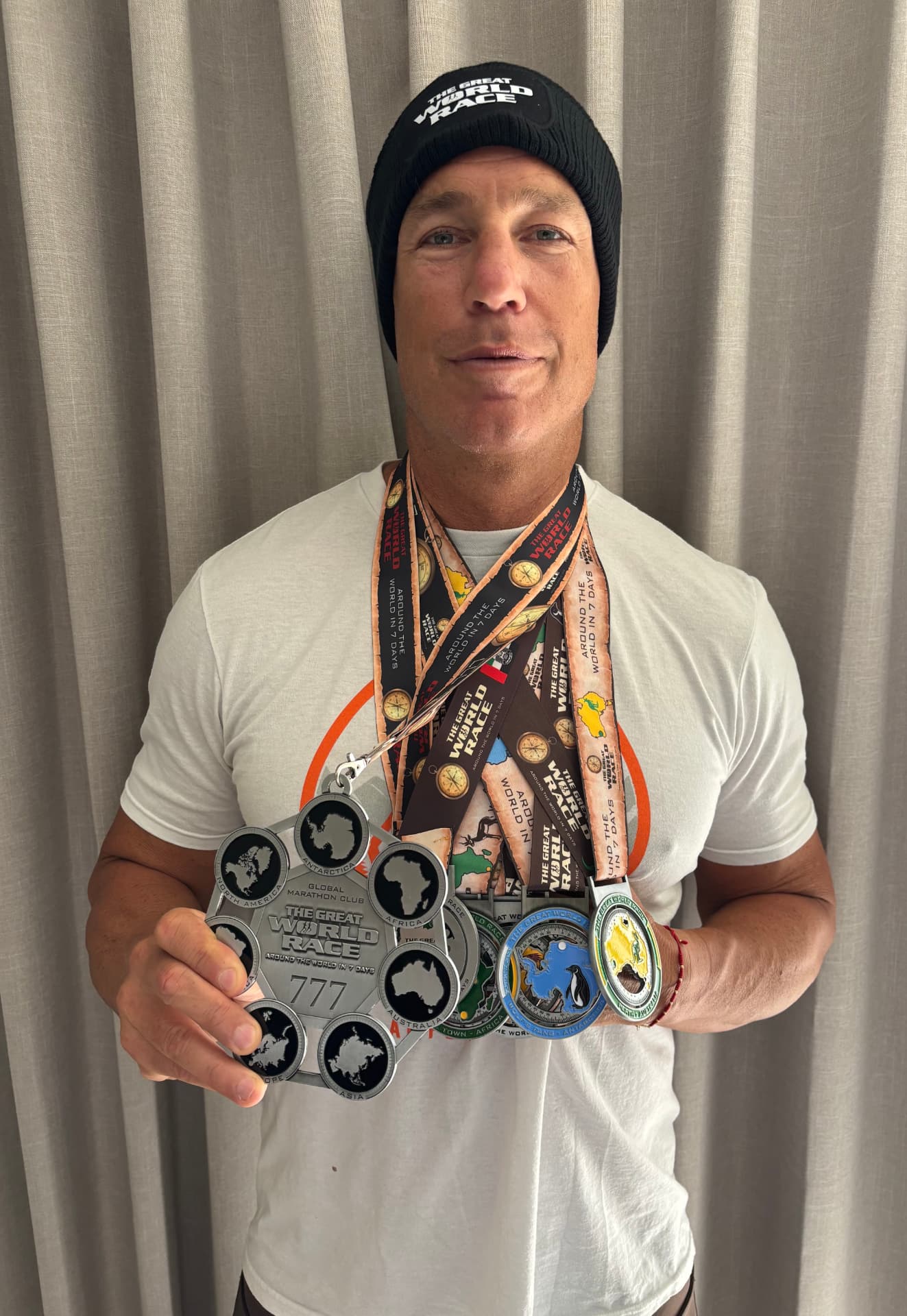 Glenn Hattem with Great World Race medals