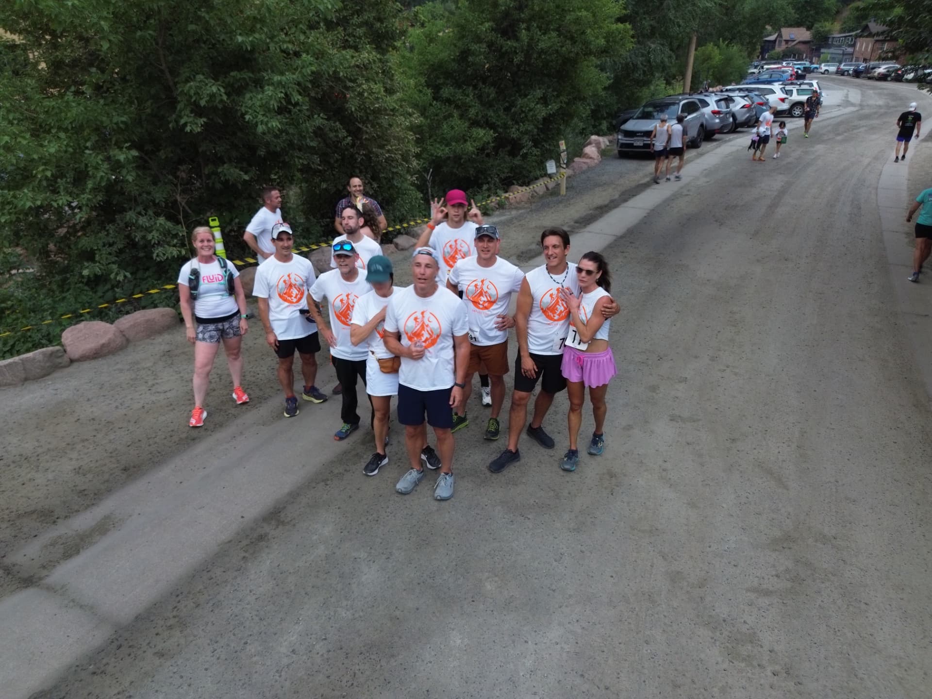 316 runners gathered together on a gravel road