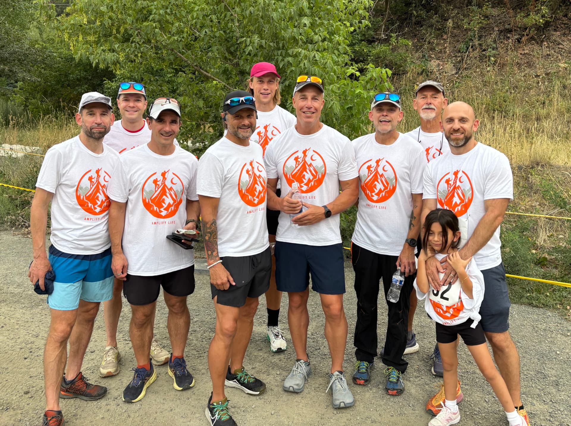 316 runners in white Amplify shirts at a community race